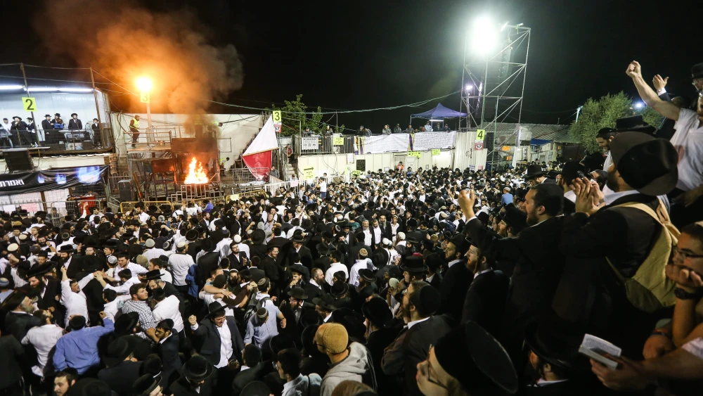 Haredi men take part in the celebration of the Jewish holiday of Lag B’Omer on Mount Meron in northern Israel. May 7, 2015. Credit: Meir Vaknin/Flash90