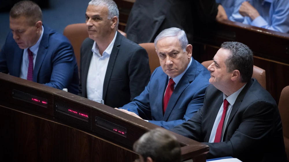 Israeli Prime Minister Benjamin Netanyahu with Israeli parliament members during a vote on a bill to dissolve the current Knesset in Jerusalem, May 29, 2019. Credit: Yonatan Sindel/Flash90.