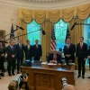 U.S. President Donald Trump and senior members of his administration in the Oval Office of the White House as Sudan agrees to normalize relations with Israel. Credit: Michael Crowley/The New York Times for White House/POOL.