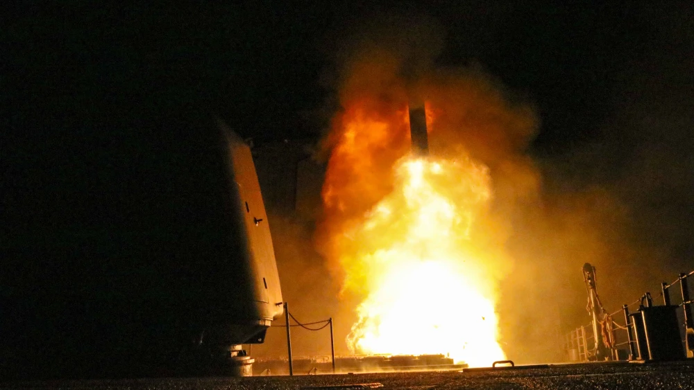 The “USS Monterey” guided missile-cruiser fires a Tomahawk missile in the U.S. 5th Fleet area of operations against Syria over its use of chemical weapons, April 13, 2018. Credit: Navy Photo by Lt. j.g Matthew Daniels.