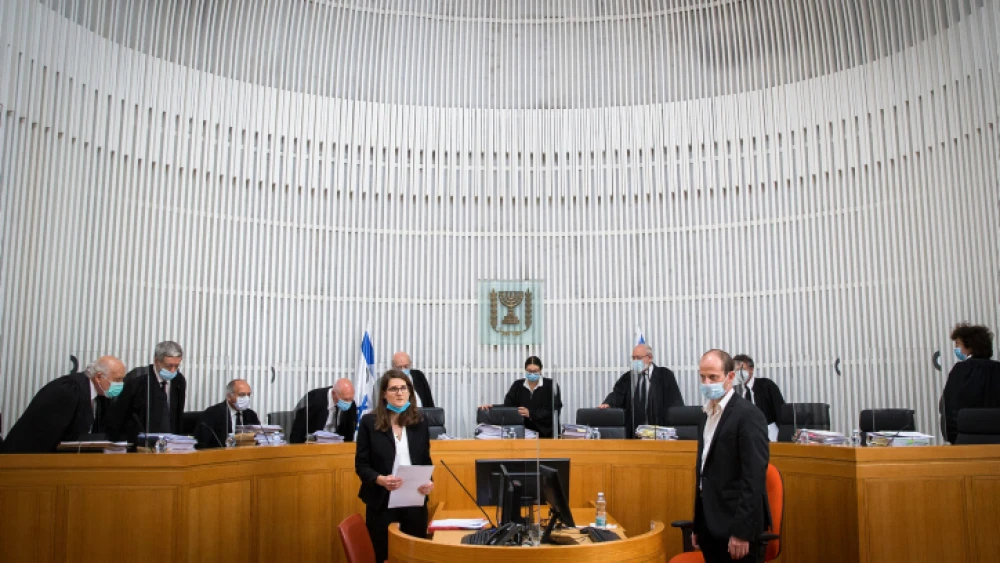 Israeli Supreme Court Chief Justice Esther Hayut arrives at the Supreme Court in Jerusalem on May 3, 2020, to hear a petition against the coalition agreement between the Blue and White and Likud parties. Photo: Oren Ben Hakoon/POOL.