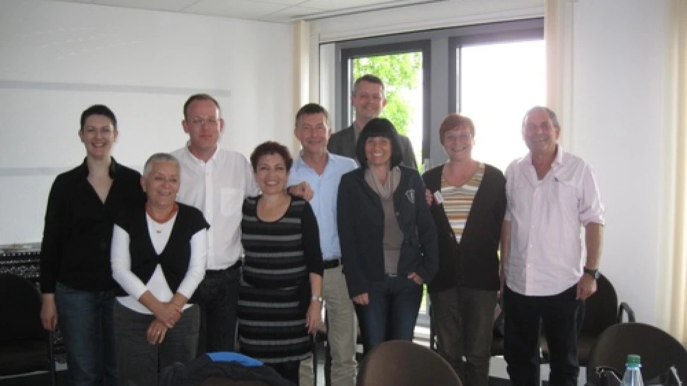 Pictured in Leipzig, Germany, are members of the Israeli team that partnered with Germany to assess how each country portrays the other’s history in school textbooks, for ages 12-18, and to make recommendations to improve future textbooks. Third from right, in back, is Dirk Sawdowski, chairman of the German-Israeli Textbook Commission, and second from left, in back, is Dr. Arie Kizel, the chairman coordinating the Israeli team. Credit: Courtesy Dr. Arie Kizel.