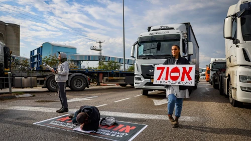 People block the entrance to Ashdod Port during a protest against aid trucks entering the Gaza Strip, Feb. 1, 2024. Photo by Chaim Goldberg/Flash90.