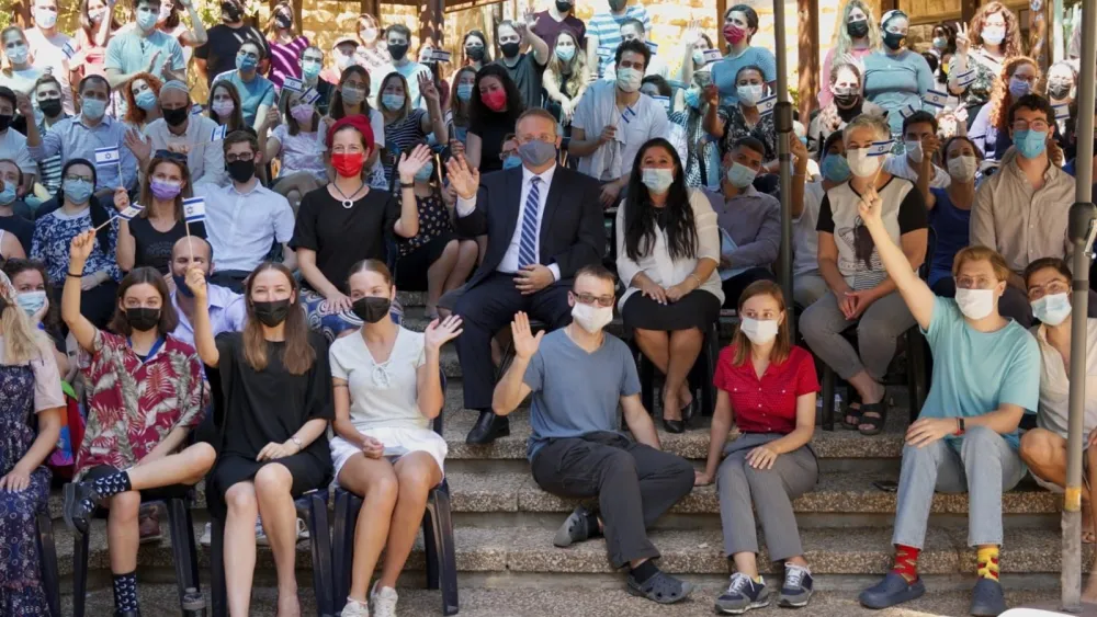 Yaakov Hagoel, acting chairman of the Jewish Agency for Israel Executive, with new Olim from 26 countries who recently joined the J.A.'s Ulpan Etzion in Jerusalem. Photo credit: Elad Brami.