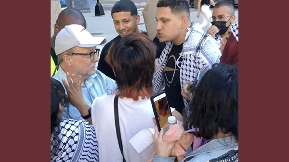Members of UMass Boston's chapter of Students for Justice in Palestine surround, shove and hurl epithets at CAMERA researcher Dexter Van Zile outside the ADL office in the city. June 24, 2021. Source: X.
