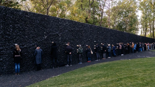 “The Crystal Wall of Crying,” an installation by sculptor Marina Abramovich at Babi Yar in Ukraine, is made of anthracite and rock quartz crystals that light up at night. Credit: Photographers Archive (The Gate).
