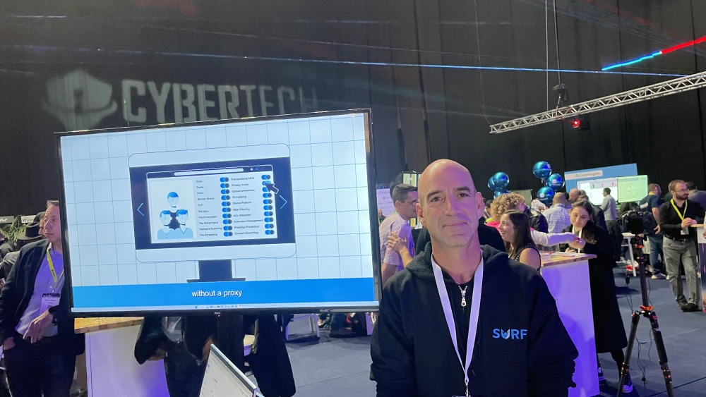 Ziv Yankowitz at the Surf Security exhibit. Photo by Judith Segoloff.