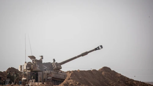 Israeli soldiers and artillery at a staging area in southern Israel, near the border with the Gaza Strip, on Nov. 13, 2019. Photo by Yonatan Sindel/Flash90.