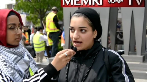 Iranian-born student Nasim Agari speaks to an interviewer during the Annual Walk for Al-Quds in Toronto, Canada on May 31, 2019. Agari said she does not consider herself to be Canadian because Canada is a “white-supremacist, colonialist, racist project,” much like Israel. (MEMRI)