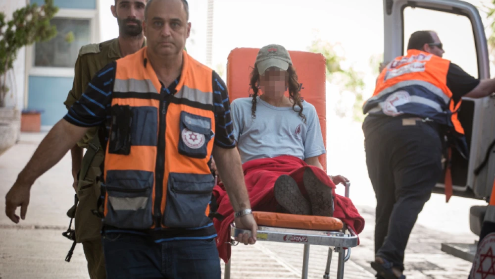 A young Jewish boy is evacuated at Hadassah Ein Karem hospital in Jerusalem after being injured in a shooting attack near Otniel in Judea and Samaria, on July 1, 2016. Photo: Hadas Parush/Flash90.