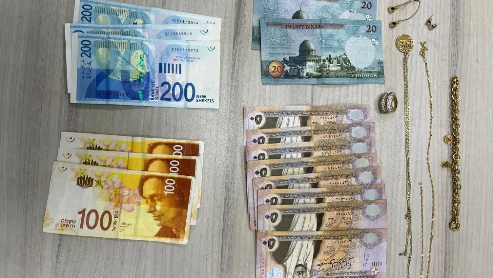 Cash and jewelry seized by police during a crackdown on recipients of P.A. terror stipends in eastern Jerusalem, June 26, 2023. Credit: Israel Police Spokesperson.