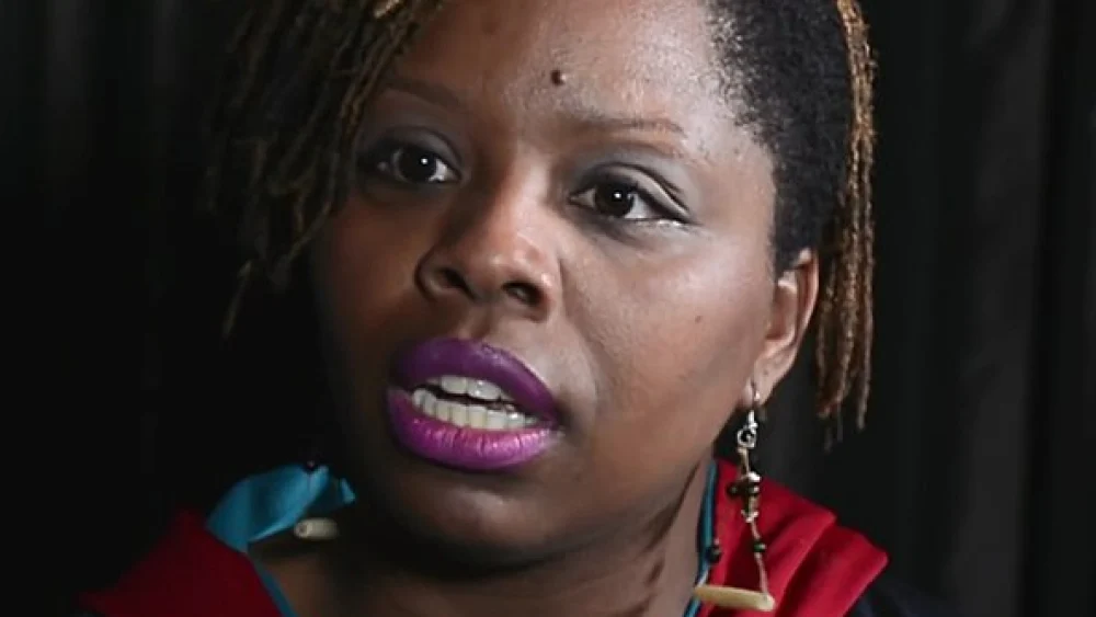 Patrisse Cullors, American artist, writer and co-founder of the Black Lives Matter movement at “The Laura Flanders Show," 2015. Credit: Wikimedia Commons.