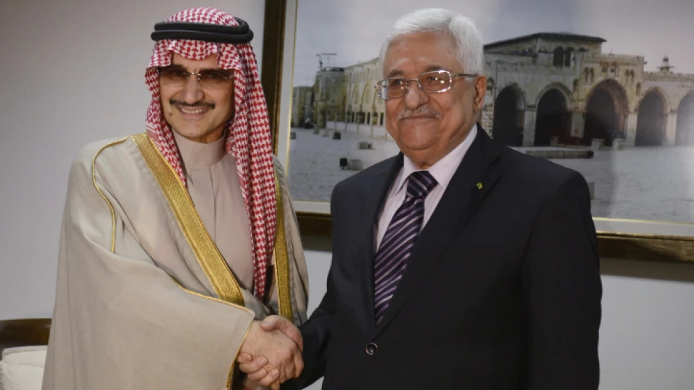 Saudi prince Al-Walid bin Talal meets with Palestinian Authority leader Mahmoud Abbas in the West Bank city of Ramallah, on March 4, 2014. Photo by Issam Rimawi/Flash90.