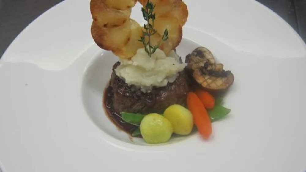 One of Chef Avram Wiseman’s culinary creations: a filet of beef with Bordelaise, wasabi mashed potatoes, Maxim potatoes and mixed vegetables. Credit: Courtesy of Chef Avram Wiseman.