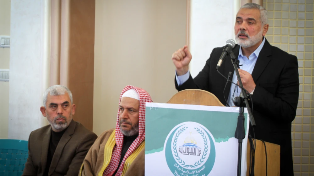 Yahya Sinwar (left), the leader of Hamas in the Gaza Strip, with senior political leaders Khalil al-Haya (center) and Ismail Haniyeh in southern Gaza on Feb. 24, 2017. Photo by Abed Rahim Khatib/Flash90.