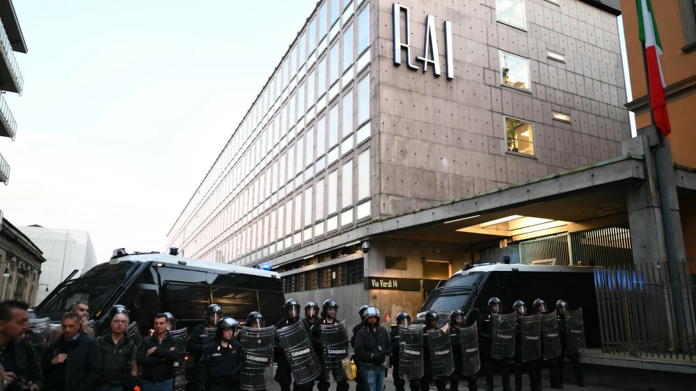 Italian police officers stand near the national broadcaster RAI studios during a demonstration by anti-Israel protesters in Turin, Italy on April 10, 2026. Photo by MARCO BERTORELLO / AFP via Getty Images.