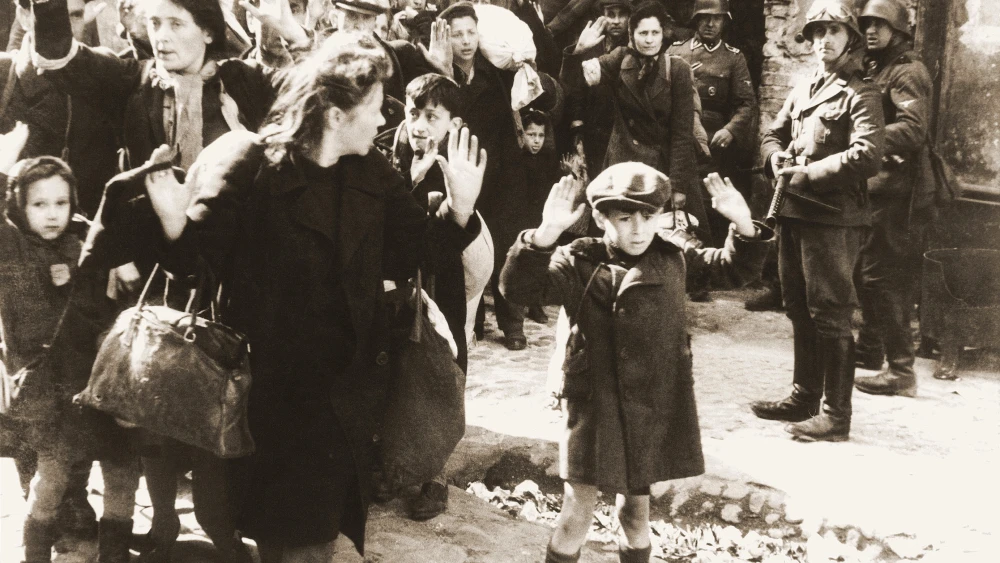 One of the most famous pictures of Jews being rounded up by Nazi Germans during the Holocaust, this from the Warsaw Ghetto Uprising in May 1943. Credit: Wikimedia Commons.