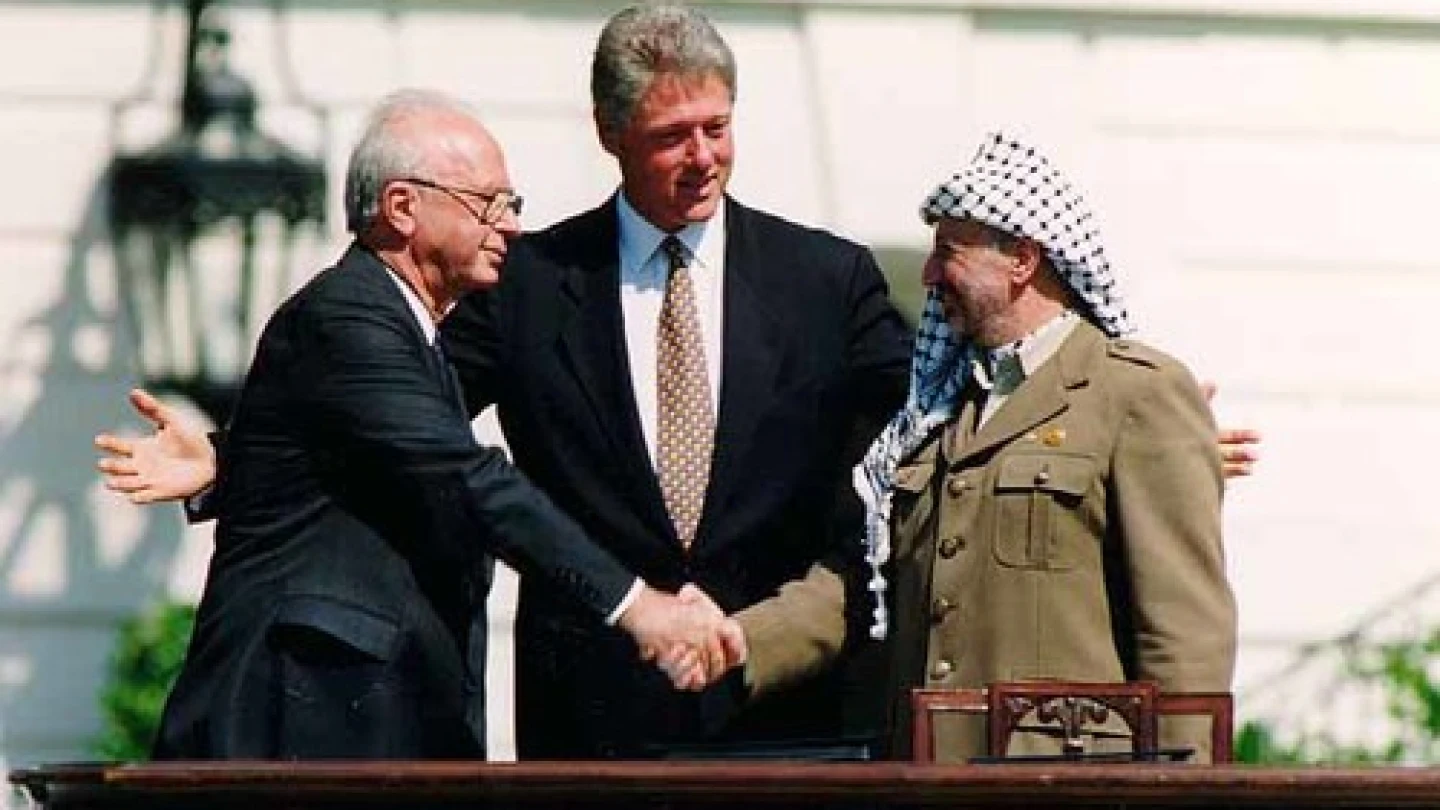 Yitzhak Rabin, Bill Clinton, and Yasser Arafat at the signing of the Oslo Accords on Sept. 13, 1993. In an op-ed for JNS.org, Israeli Deputy Defense Minister Danny Danon wrote of renewed Israeli-Palestinian conflict negotiations, "Almost 20 years after Yitzhak Rabin attempted to conjure arch-terrorist Yasser Arafat into a worthy partner for peace, it seems that we have not learned the lessons from the past." Credit: Vince Musi/The White House.