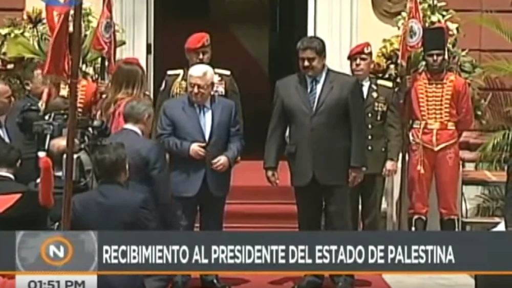 Palestinian Authority leader Mahmoud Abbas is officially received by Venezuelan President Nicolás Maduro. Source: YouTube.
