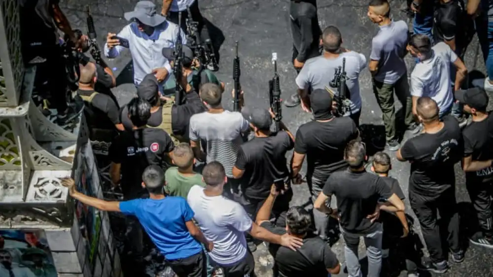 Armed Palestinians march after an Israeli military operation in Jenin, July 5, 2023. Photo by Nasser Ishtayeh/Flash90.