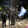 Protesters attend a demonstration against Israeli Prime Minister Benjamin Netanyahu and the nationwide lockdown in Tel Aviv on Oct. 6, 2020. Photo by Gili Yaari/Flash90.