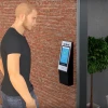A CGI example of the GateGuard™ face-recognition intercom and AI doorman system in use. Credit: Screenshot.