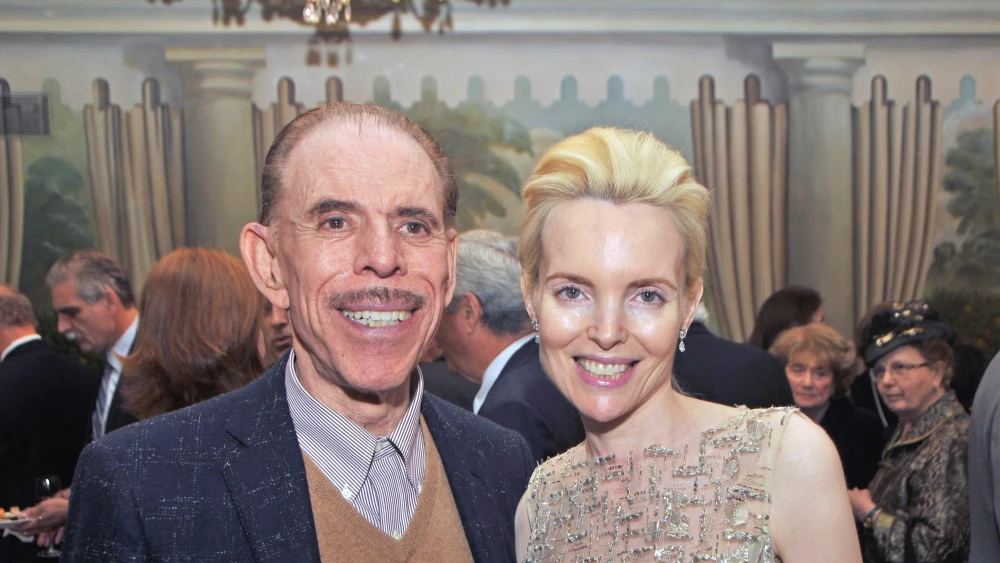 American artist and graphic designer Peter Max and wife Mary attend a gala of the Israel Cancer Research Fund (where they were the guests of honor) at the Pierre Hotel, New York, New York, December 3, 2012. Photo by Tim Boxer/Getty Images.