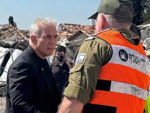 Israeli opposition leader Yair Lapid (Yesh Atid Party) visits the Beit Shemesh site where an Iranian ballistic missile killed nine Israelis, March 2, 2026. Credit: Yair Lapid/X