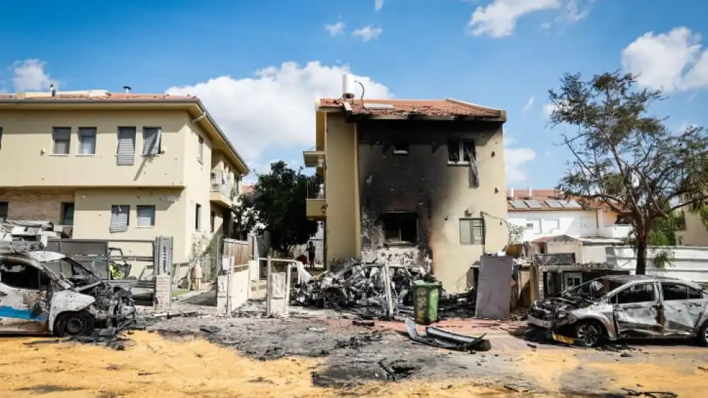 The site after a rocket fired from the Gaza Strip landed into Israel in Mazkeret Batya, Oct. 7, 2023. Photo by Nati Shohat/Flash90.