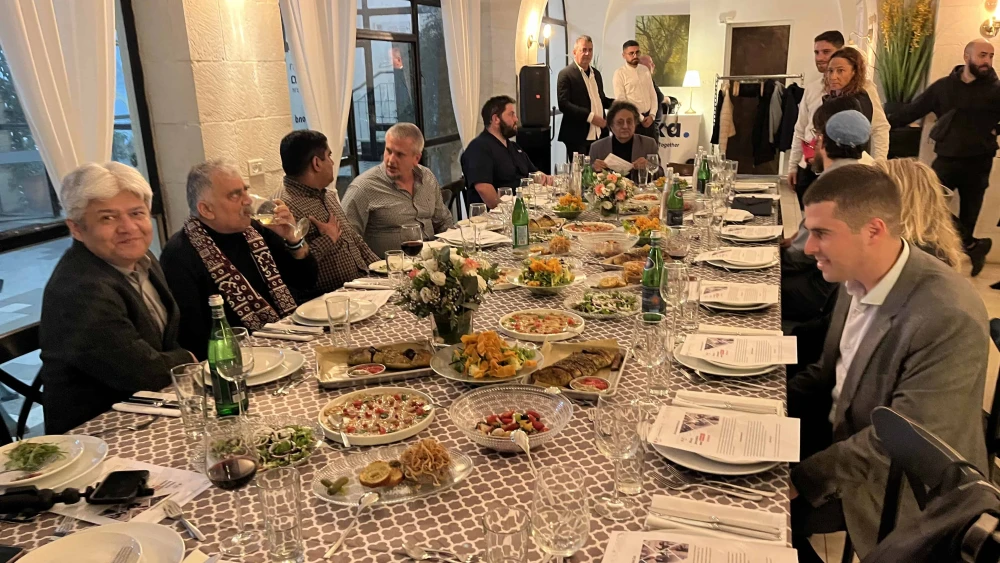 South Asian Muslim leaders, journalists, influencers, professionals, academics and civil society activists visiting Israel as part of a coexistence initiative share a dinner in Jerusalem, Dec. 3, 2024. Photo: Josh Hasten.