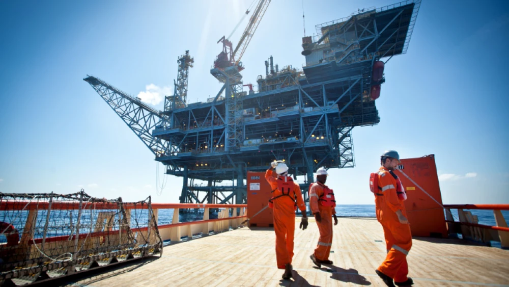 Workers on the Israeli Tamar gas-processing rig off the coast of Ashkelon. Noble Energy and Delek are the main partners in the Tamar gas field, estimated to contain 10 trillion cubic feet of gas, June 23, 2014. Photo by Moshe Shai/Flash90.