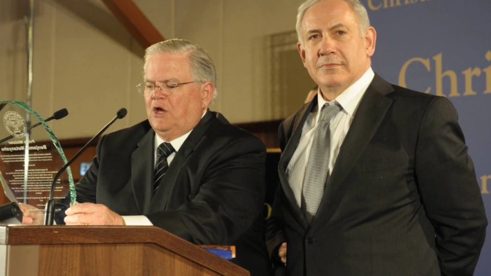 Pastor John Hagee (left) speaks next to Israeli Prime Minister Benjamin Netanyahu during a mission of approximately 800 members of Christians United for Israel in Jerusalem, March 18, 2012. Photo by Amos Ben Gershom/Flash90