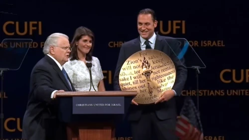 U.S. Ambassador to the United Nations Nikki Haley was presented with the “Defender of Israel” award, eliciting loud cheers from the crowd at the 13th annual Christians United for Israel summit, held from July 23-24, 2018. Screenshot: YouTube.