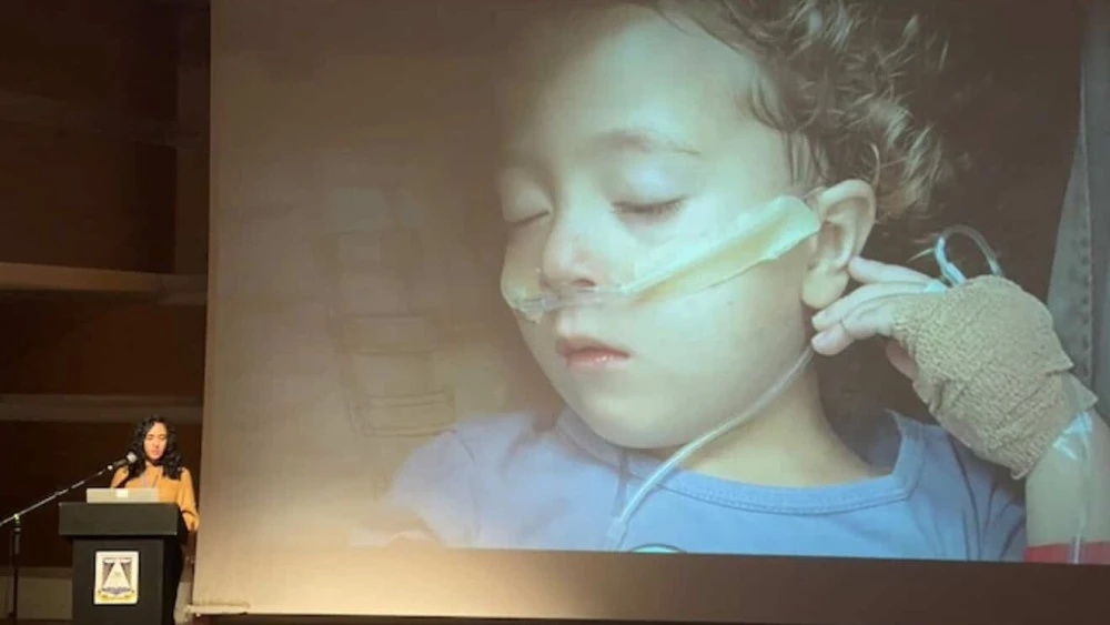 Nataly Whitmarsh's daughter Adele suffers severe effects from air pollution, Rosh HaAyin, Jan. 1, 2026. Photo by David Isaac.