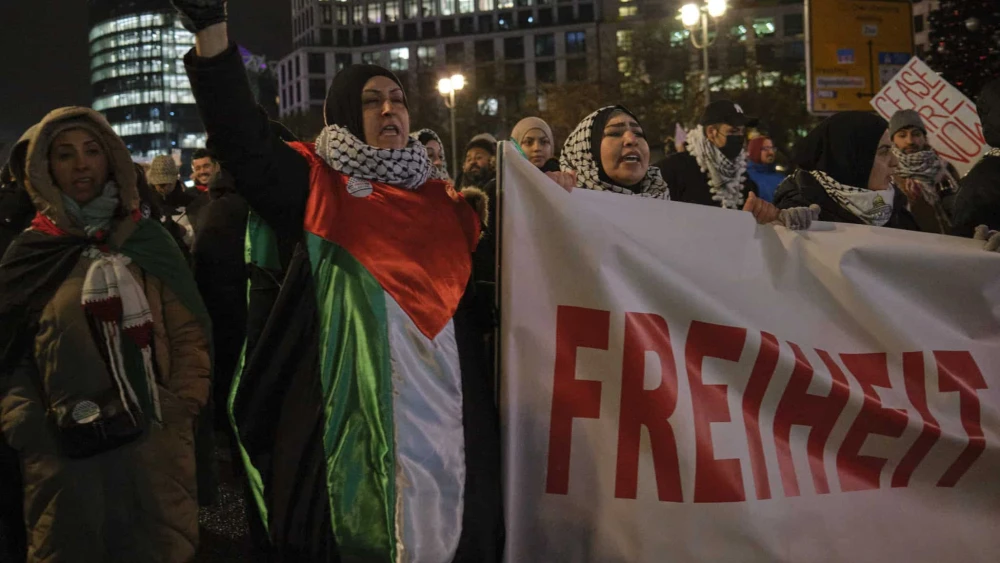 Women attend an anti-Israel rally in Berlin on Nov. 29, 2023. Photo by Matthias Berg/Flickr.