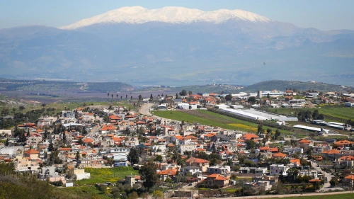 View of the Circassian village of Rehaniya, and Mount Hermon covered with snow in Northern Israel, as it seen from Route 886, on March 8, 2019. Credit: Yaakov Lederman/Flash90