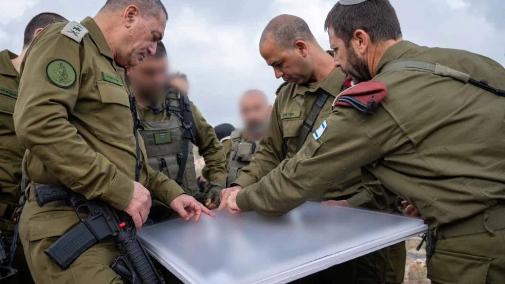 IDF Chief of Staff Lt. Gen. Eyal Zamir (left) conducts an assessment at the scene of a deadly terror attack in Samaria, May 15, 2025. Credit: IDF.