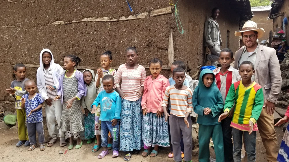Children with Aaron (A.Y.) Katsof, director of the Heart of Israel. Credit: The Heart of Israel.