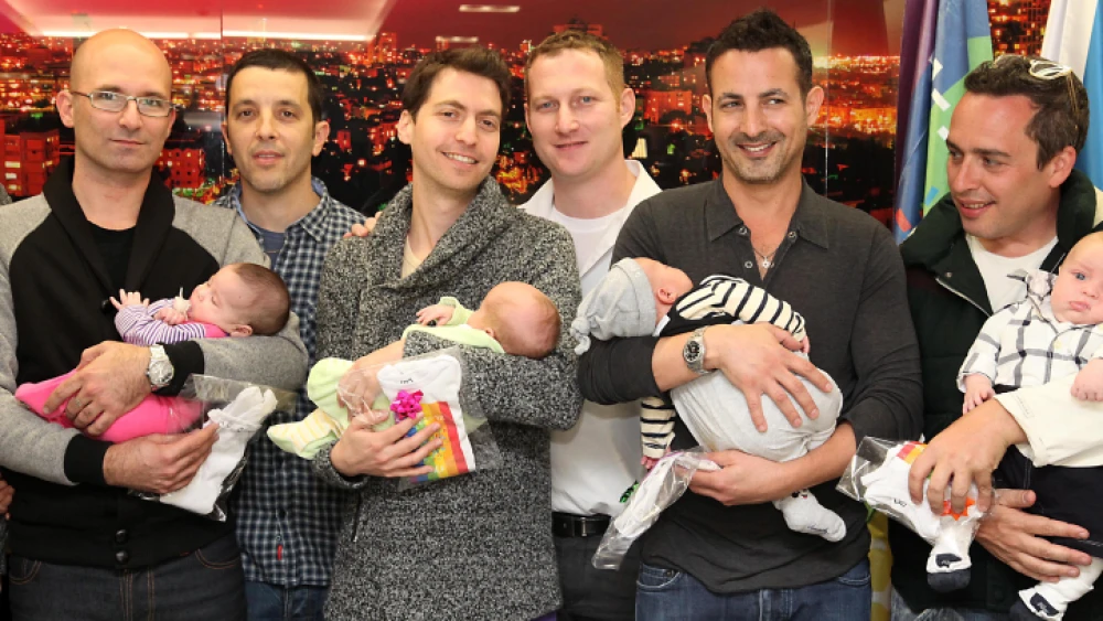 A reception held for gay fathers who recently returned from Thailand, where local surrogate women gave birth to their babies, Feb. 20, 2014. Photo by Gideon Markowicz/Flash90.