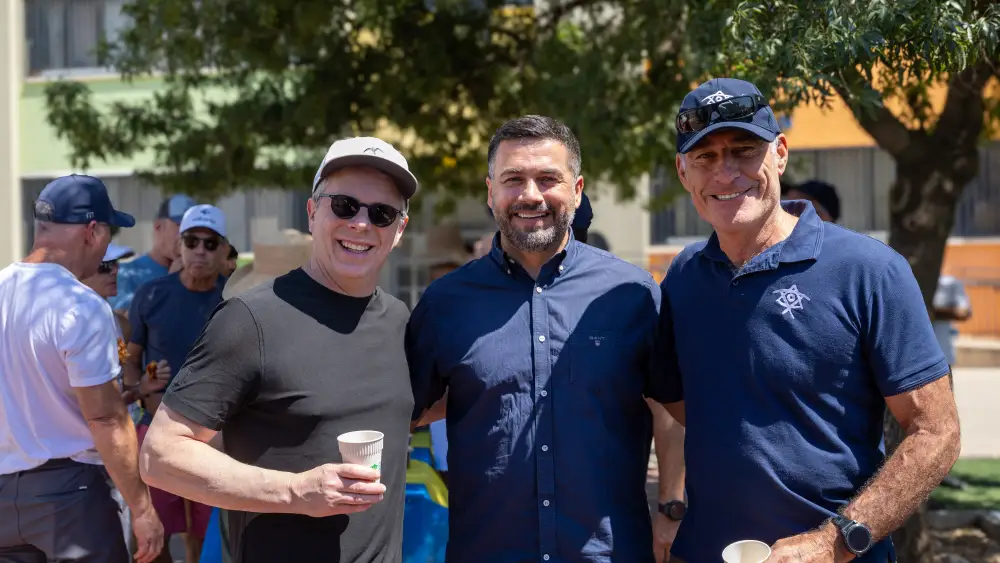 From left: David Kaplan; Dolan Abu Saleh, head of the Majdal Shams Municipality; and Gidi Mark, International CEO of Birthright Israel in the Druze town in Israel's Golan, July 2026. Credit: Erez Elma Uzir/Courtesy of Birthright Israel.