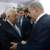 Israeli Prime Minister Benjamin Netanyahu meets with Palestinian Authority leader Mahmoud Abbas during the funeral of late Israeli President Shimon Peres, held at Mount Herzl in Jerusalem on Sept. 30, 2016. Credit: Amos Ben Gershom/GPO.