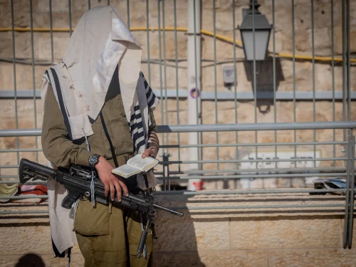 Ultra-Orthodox Jewish soldiers from the Hasmonean Brigade take part in a beret march after completing seven months of basic and advanced training, at the Western Wall in Jerusalem's Old city on Aug. 6, 2025. Photo by Chaim Goldberg/Flash90.