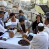 A mixed-gender Jewish prayer service at the Robinson’s Arch compound, near the Western Wall’s main worship area, in July 2014. Credit: Gershon Elinson/Flash90.