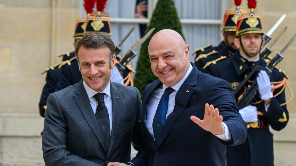 French President Emmanuel Macron, left, receives Joseph Aoun, president of the Republic of Lebanon, in the main courtyard during the reception prior to the official meeting, at the Elysee presidential palace in Paris, France, on March 28, 2025. Photo by Antoine Gyori - Corbis/Corbis via Getty Images.