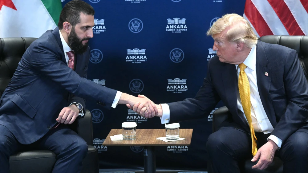 Syrian President Ahmed al-Sharaa (L) and U.S. President Donald Trump meet on the sidelines of the NATO Summit at Bestepe Presidential Compound in Ankara, on July 8, 2026. Photo by Saul Loeb/AFP via Getty Images.
