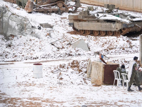 Israeli soldiers seen in the snow on the Israeli border with Lebanon, on Feb. 24, 2025. Photo by Ayal Margolin/Flash90.