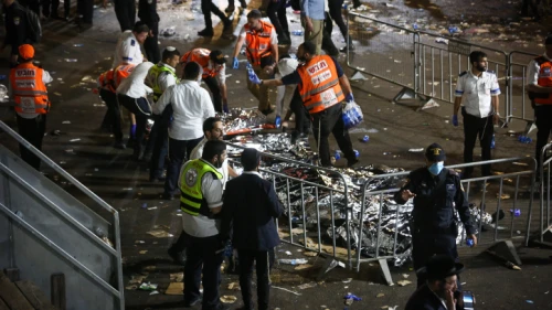 Israeli rescue service people and police near the scene of the deadly stampede at Mount Meron on Lag B'Omer, April 30, 2021. Photo by David Cohen/Flash90.