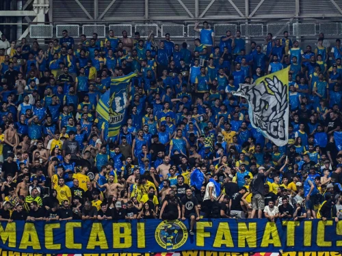 Maccabi Tel Aviv fans attend an Israeli Premier League match against Maccabi Haifa at Sammy Ofer Stadium in Haifa on May 19, 2025. Credit: Flash90.