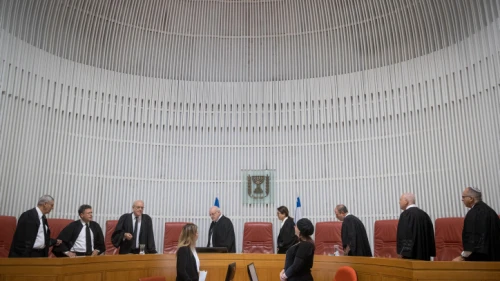 Israeli Supreme Court justices and Supreme Court president Esther Hayut arrive in the courtroom in Jerusalem. Photo by Yonatan Sindel/Flash90.