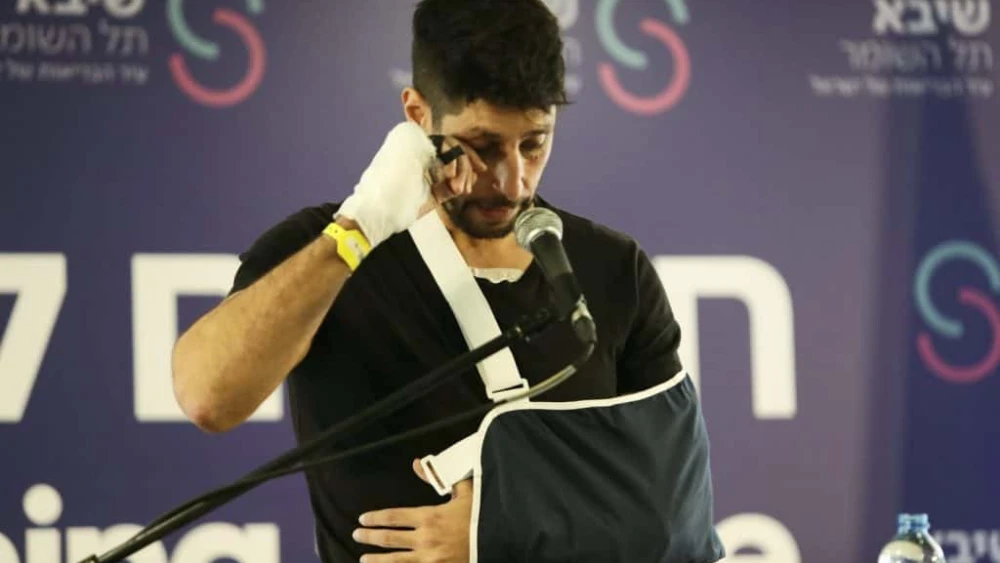 Israeli actor Idan Amedi talks to reporters upon being released from Sheba Medical Center in Ramat Gan, Jan. 25, 2024. Photo by Gideon Markowicz/TPS.